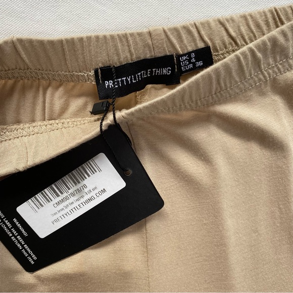 PrettyLittleThing Split Hem Leggings Size 4 NWT - Picture 3 of 8
